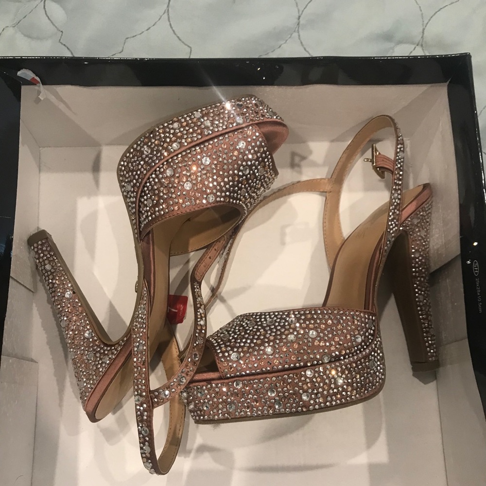 Heels 4”, blush fabric with lots of rhinestones.